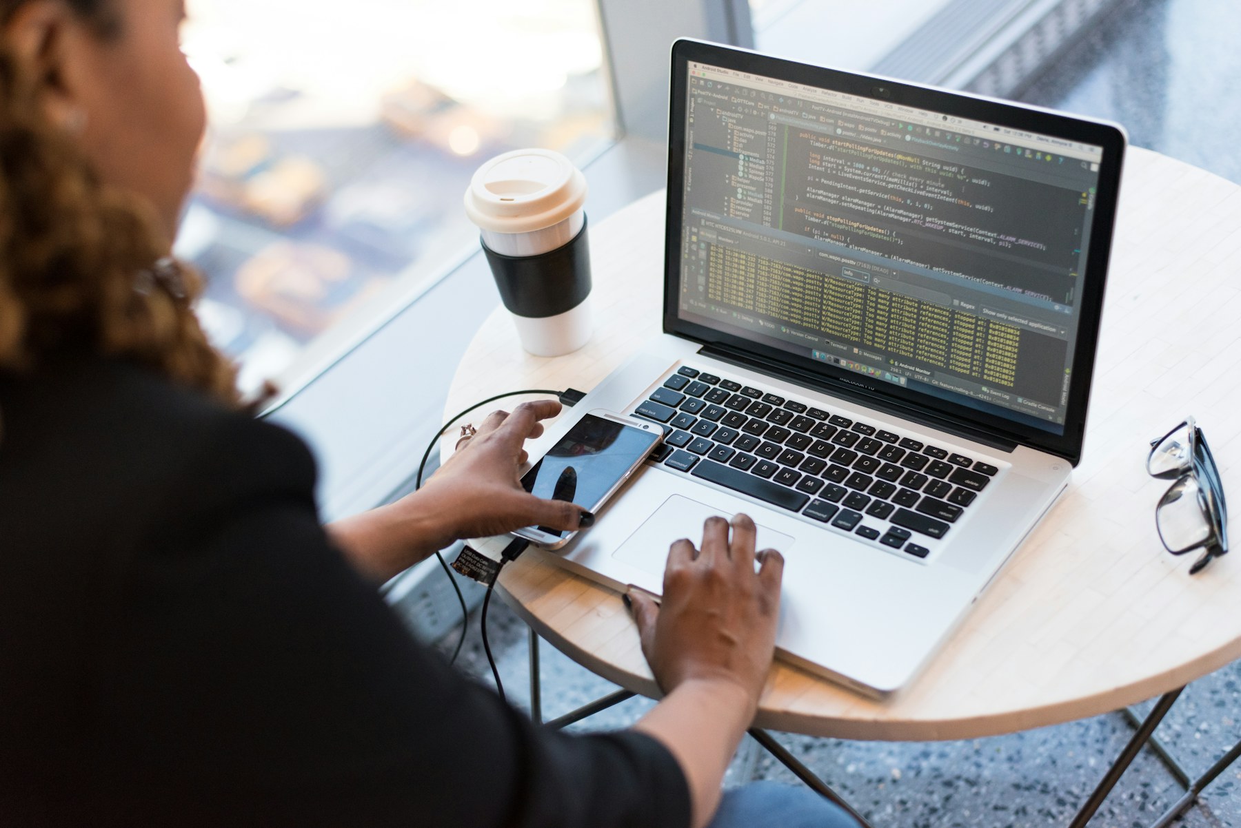 Website Design for Tradespeople: How to Get More Quote Requests - Professional working on a laptop in an office